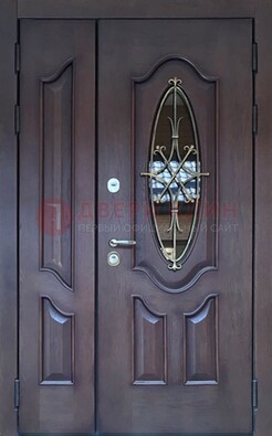 Темная металлическая дверь Винорит со стеклом и ковкой ДСК-239 в Саратове